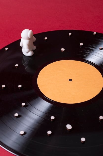 A close-up of a record player with a vinyl record spinning, symbolizing the act of listening to music intros.