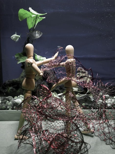 A visually striking shot comparing traditional hand-drawn animation cells with modern 3D CGI animation models, side-by-side, highlighting the evolution of animation techniques and the differences in visual style.