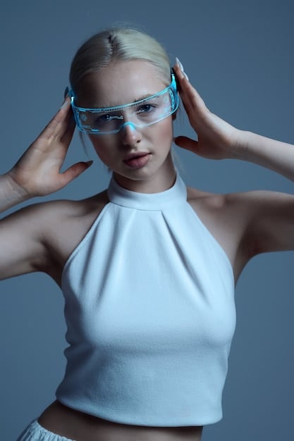 A futuristic young woman wearing sleek augmented reality glasses, with holographic interfaces appearing around her showing statistics and analysis of a streaming series she is watching. She is holding a remote control that subtly glows, indicating interactive elements on screen.