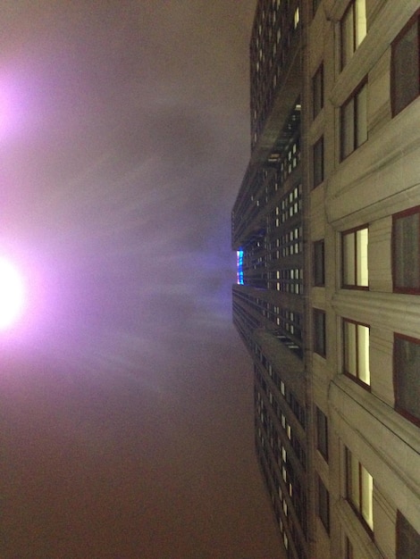 A futuristic cityscape at dusk, with glowing neon pathways and towering skyscrapers, reflecting the advanced yet melancholic atmosphere of 'Echoes of the Void'.