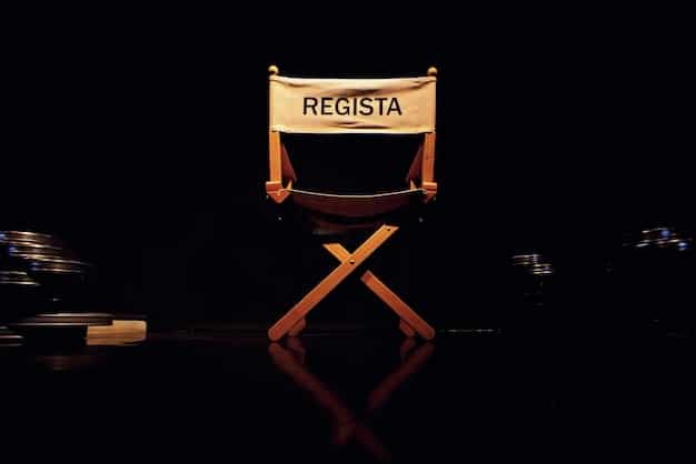 A director's chair on a film set, with a blurred historical document in the background, symbolizing the creative process of adapting historical events for television.