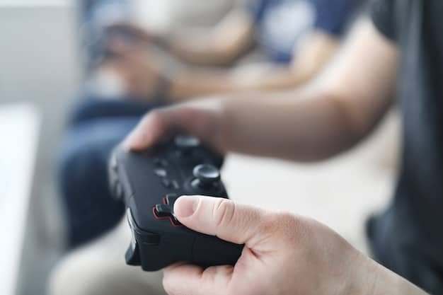 A close-up shot of a remote control with a finger pressing the 