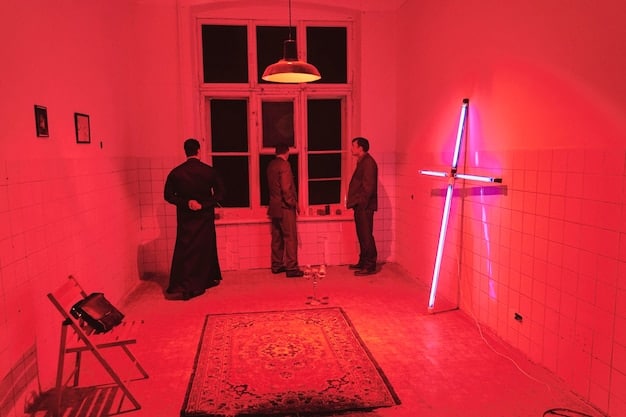 A behind-the-scenes shot of the 'Squid Game' Season 2 set, showcasing the intricate production design and the scale of the filming operation. Include crew members working on lighting or set construction to emphasize the effort involved. This shot should tie into the excitement for 'Squid Game' Season 2: Netflix Reveals New Games and Characters – Release Window Set for Summer 2025.