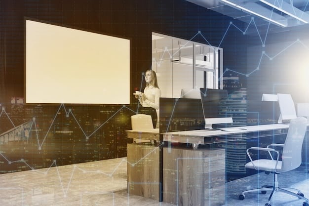A stark, minimalist office space within Lumon Industries. Close-up showing the monitors displaying abstract data patterns, along with the Lumon employee who is working overtime. This is to highlight the stressful environment and hard labor they do at Lumon.